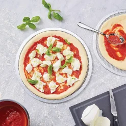 2 Plaques à pizza perforées en alu pour cuisson au four 30 et 33 cm FM Professional