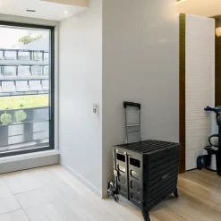 Chariot de course 8 roues - Pliable - Plastique - Avec Couvercle - Noir - 70Kg