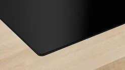 Plaque de cuisson induction 3 foyers - coloris noir - l.59,2 x P.52,2 x H.5,1 cm - Bosch PUJ611BB5E