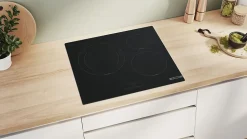 Plaque de cuisson induction 3 foyers - coloris noir - l.59,2 x P.52,2 x H.5,1 cm - Bosch PUJ611BB5E